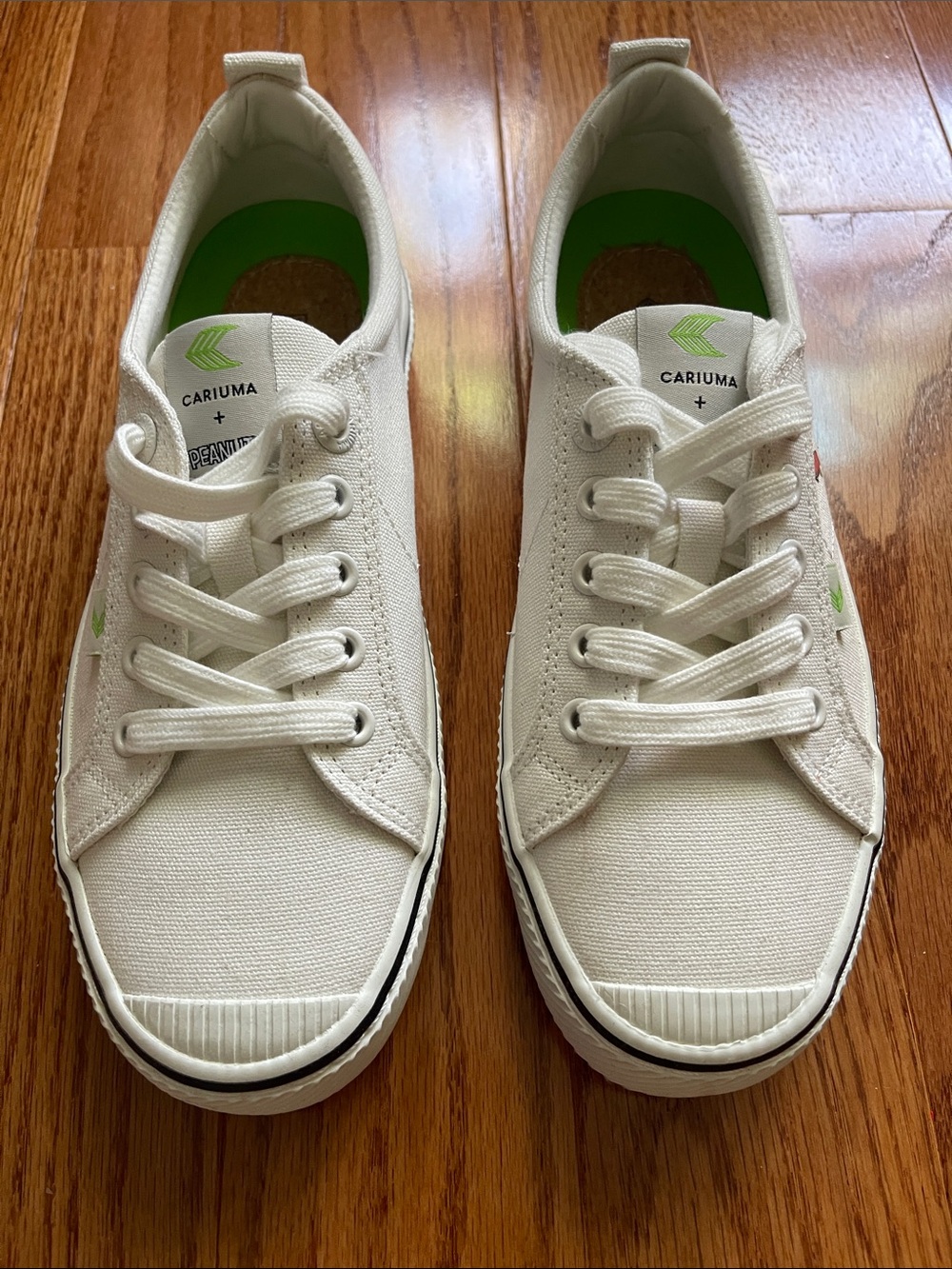 Cariuma x Peanuts Collaboration Sneakers in Off-White with Lime Green Accents